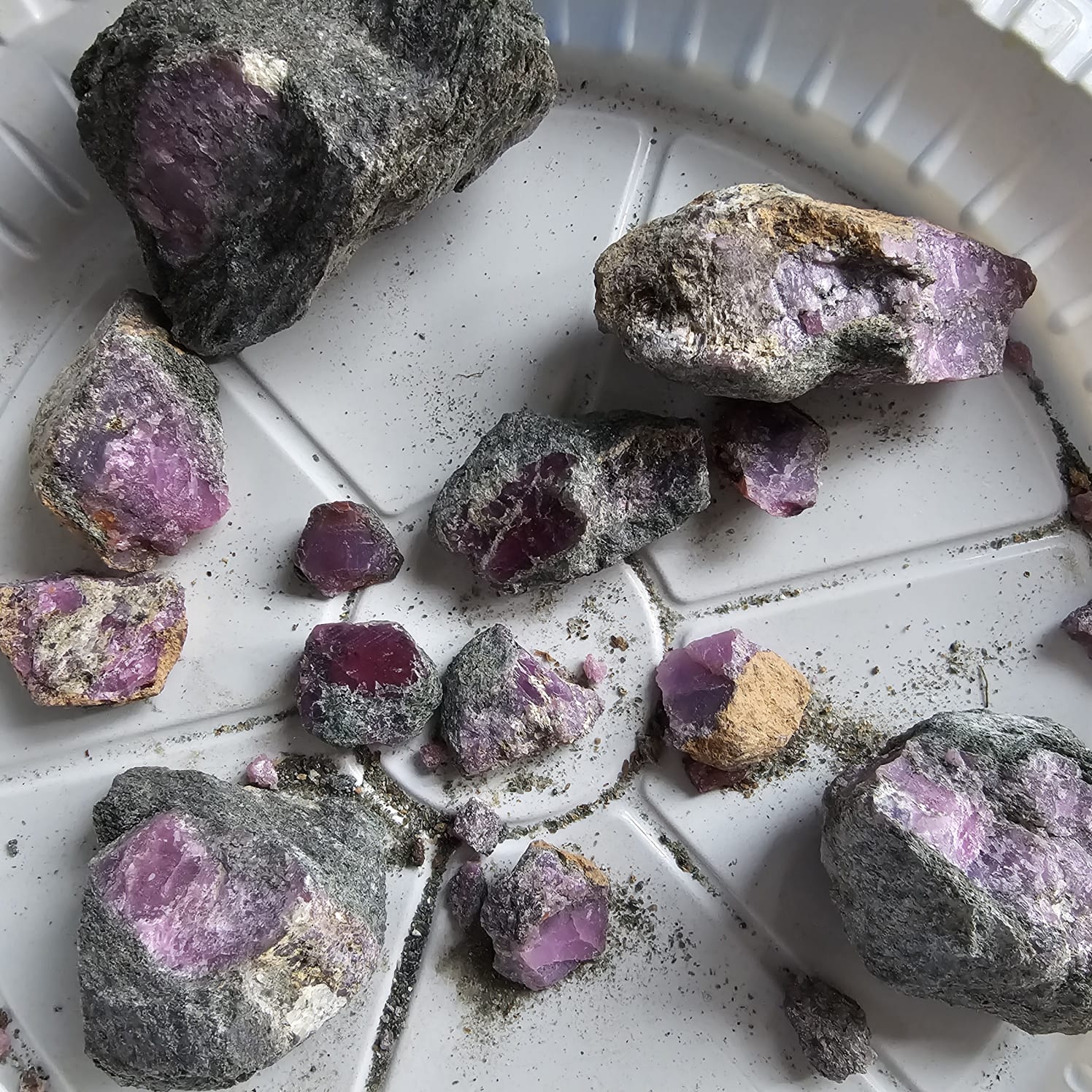Rough coloured stones collected for preliminary sorting